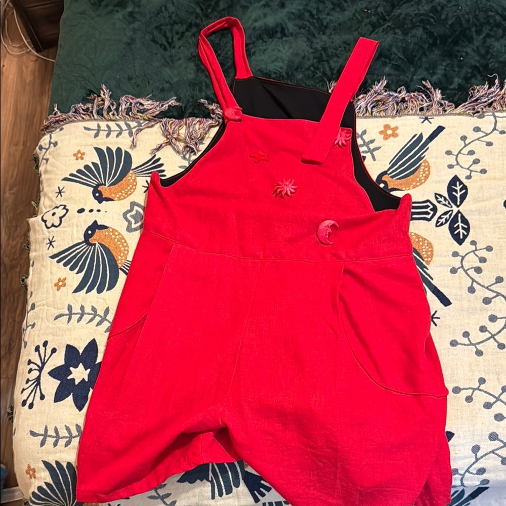 Vibrant Asymmetrical Red Overalls with Button Accent